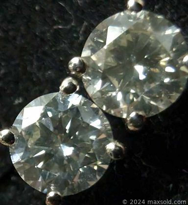 MaxSold Auction: This online auction features loose gemstones such as peridot, opals, rubies, tanzanites, zultanite, emeralds, and moissanite earrings & rings, brown diamond rings, sterling silver jewelry, coins, silver men’s chain, jewelry findings, and much, much, more!!