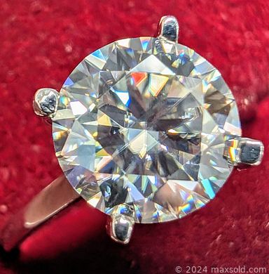 MaxSold Auction: This online auction includes Diamond rings, Opal and Diamond pendants, Emerald earrings, chains, necklaces, pearls and other jewelry, loose gemstones, coins and many more!