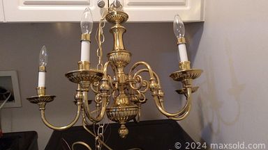 MaxSold Auction: This online auction features exercise equipment, chandeliers, desk chairs, area rug, corner curio cabinet, printer, shelving, club chair, yard tools, bay boat, Doug Forsythe prints, and much more!!