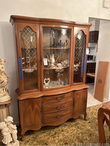 MaxSold Auction: This online auction features furniture such as china cabinets, Bernhardt buffet, dressers, vinyl sofa bed, aquarium bar, dining set, folding tables, upholstered chair, bar stools, Art Deco wardrobe, twin bedframe, Lowery organ, mirrored bench and others, toys, wall art, decor, figurines, vinyl records, vintage hair dryers, silverplate, pedestals, linens, seasonal decor, barware, books, Edelstein china, kitchenware, small kitchen appliances, accessories, electronics, linens, vintage clothing, wheelchair and much more!