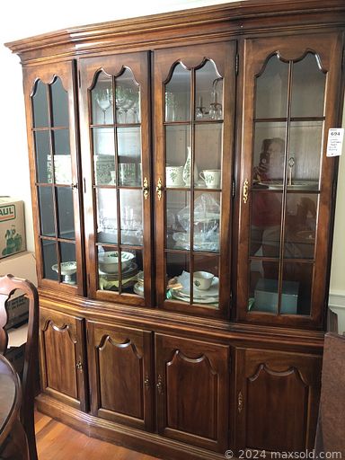 MaxSold Auction: This online auction includes furniture such as a wicker coffee table, china cabinet, chairs, bookcase, nightstands, dresser, bedframe, kitchen cart, armchairs and others, wall art, lamps, rugs, Depression glass, Royal Doulton figurines, decorative boxes, linens, clothing, accessories, crystalware, seasonal decor, kitchenware, small kitchen appliances, Rogers Bros. flatware, Lenox and other china, silverplated items, religious decor and more!