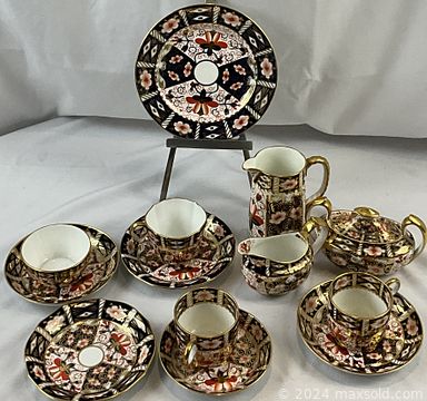 MaxSold Auction: This online auction features soapstone carvings, milk glass, Royal Doulton figurines, antique cranberry glass, teacup/saucer sets, antique Bennington pottery, oil lamps, sterling jewelry, Nikolas Hornyansky prints, map reproductions, art glass, brass wall sculpture, watches, vintage tools, coins, Bunnykins, antique bottles, pocket watch, and much, much, more!!!