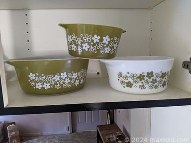 MaxSold Auction: This online auction features Tiffany-style lamp, doll collection, games, vinyl records, jewelry, wall masks, cookie jars, small kitchen appliances, shoes & clothing, NIB leaf blower and much more!