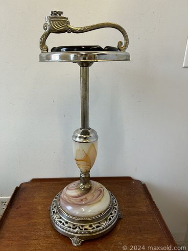 MaxSold Auction: This online auction includes lamps, artworks, Murano glassware, antique Kaiser stein, Vaseline glass bowl, carving, vases, decor, books, vinyl records, pocket tools, Satsuma teapot, Blue Mountain pottery and much more!