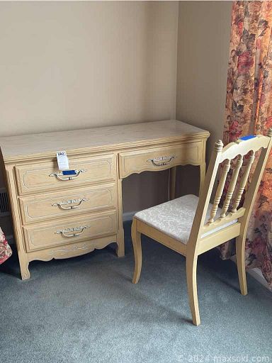 MaxSold Auction: This online auction features umbrella Stand, grandfather clock, wall art, photo frames, table, mirror, cutting mat, office supplies, Wingback Chair, weights, dining table, cabinet, wine rock, glassware and much more!