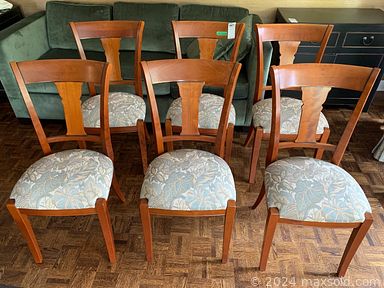MaxSold Auction: This online auction features hardwood dining chairs, elmwood cabinets, vintage armchairs, marble top table, patio umbrella, home decor, leather loveseat and much more!