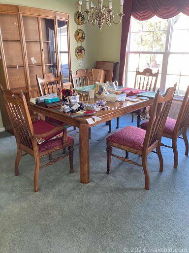 MaxSold Auction: This online auction features umbrella Stand, grandfather clock, wall art, photo frames, table, mirror, cutting mat, office supplies, Wingback Chair, weights, dining table, cabinet, wine rock, glassware and much more!