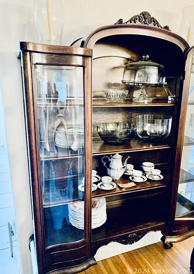 MaxSold Auction: This online auction features a curio with lights, dining table and chairs, silent butler dresser, foyer stand & mirror, crystal plates, glassware, vintage lamps, washer & dryer and much more!