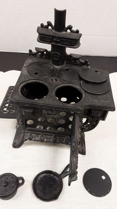 MaxSold Auction: This online auction features decanter set, cookie jar collection, Inukshucks, sandstone carvings, antique irons, art glass, brass pots & figures, art pottery, cast iron miniatures, power tools, vintage stained glass windows,  cranberry glass, Lladro figure, area rug, and much, much, more!!