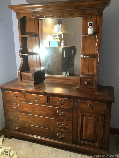 MaxSold Auction: This online auction includes Polaris jet skis, framed artwork, 14k gold, sterling silver and costume  jewelry, furniture such as 80s colonial style dresser, dining table with chairs, wood side table, electric recliners, highboy dresser, roll top desk, and antique sideboard, Lionel train supplies, lamps, fishing equipment, home decor, power tools, collector plates, vintage cookware, board games, and much more!