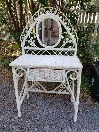 MaxSold Auction: This online auction features a Miller USA lamp, wooden sailing ship, antique chalk ware, rugs, vintage rug, vintage flagpoles, oak room divider, Coleman lanterns, Croqinole board, tea cart, Jay Turser electric guitar, CCM mountain bike, wicker vanity, vintage Adirondack chairs, baskets and other wicker items, oil lamps, 1980s flamingo decor, retro canister set and much more!