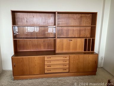 MaxSold Auction: This online auction features wood shelving unit, entertainment/display cabinet, teacup/saucer sets, sewing machine, leather chair & ottoman, and much, much, more!!
