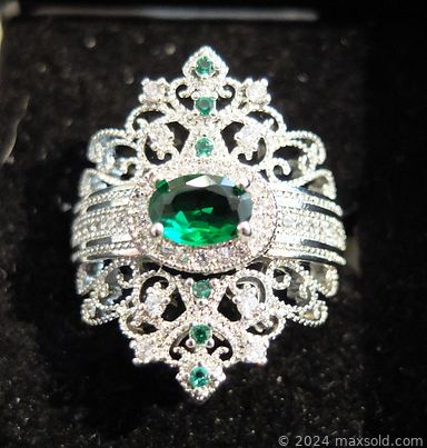 MaxSold Auction: This online auction features display cabinets, sewing machine, fashion  jewelry, world coins, novelty gold flakes, cloisonne items, clay tea set, proof coins, collector spoons, and much, much, more!!