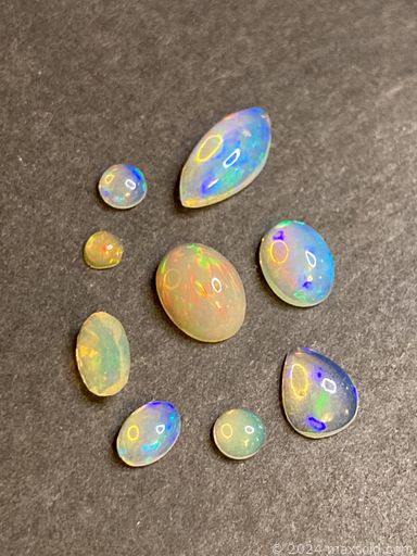 MaxSold Auction: This online auction features loose gemstones, gemstone jewelry, vintage silver matchbox, watches, Jade dragon carving, antique pocket tool, coins, sterling silver vanity set, vintage Japanese wood theatre mask, crystal bottle, pink depression glass, amethyst crystal, and much, much, more!!