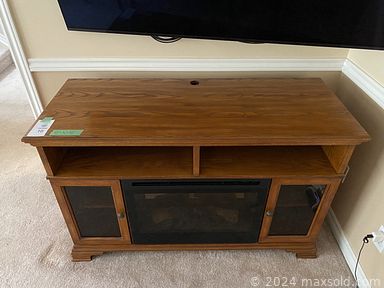 MaxSold Auction: This online auction includes furniture such as a white cabinet, shelving units, padded stool, cabinets, table set, buffet, ottomans, leather couch, leather loveseat, wooden dresser, king bedframe, black tall dresser, queen bed, shelving unit and others, Ken Zylla framed prints, Jen Walker prints and other wall art, lamps, electric fireplace, decor, records, Christmas tree, books, kitchenware, pool balls, rugs, Sony home theatre system and more!