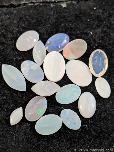 MaxSold Auction: This online auction includes jewelry such as a black Diamond ring, Moissanite earrings, Ruby ring, bracelets, chains, earrings, pendants and others, loose gemstones such as Opals, Iolite, Garnets, Aquamarine, Sapphire and many more!