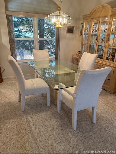 MaxSold Auction: This online auction features antique dresser, area rug, glass dining table, wine rack, power lift chairs, DVDs, office desk & chair, futon, portable kitchen island, exercise equipment, vintage stadium chairs, and much more!