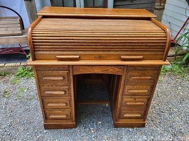 MaxSold Auction: This online auction features antique grandfather clock, CNR lantern, wicker peacock chairs, oak roll-top desk, barware, side tables, milk glass, books, wall art, display case, area rugs and much more!