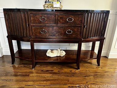 MaxSold Auction: This online auction features House of Chippendale trinket box, mirrors, candle holders, lamps, decanter, clock, and TVs, treasure chest, tub chair, bedroom furniture, executive desk & chair, parson chairs, glass top table, sports collectibles, printer, office supplies, and much, much, more!!!n