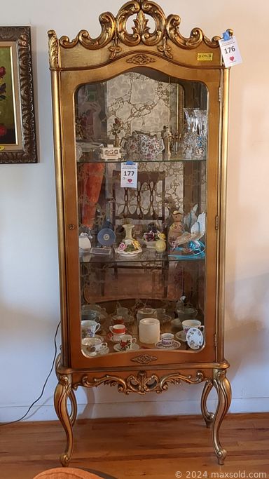 MaxSold Auction: This online auction features furniture such as a gilded curio cabinet, vintage metal patio rocking chair, outdoor chairs, vintage side table, folding tables, vintage desk, vanity, dining table, buffet, china cabinet, pedestal table and others, Capodimonte lamp, Lenox, Lladro, Lefton, Stetson and other china, wall mirror, office supplies, clothing, glassware, kitchenware, small kitchen appliances, vintage lamps, religious decor, Carmen Altopiedi artwork and other wall art, yard tools, seasonal decor, Kenmore sewing machine, records and much more!