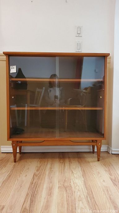 MaxSold Auction: This online auction features furniture such as a teak sideboard, extendable table, chairs, gentleman\'s and lady’s chairs, wood shelving units, secretary desk, loveseat, chest, antique rocker, teak dining table, vintage dresser, stools, display cabinet, antique chair and others, Birks and Gorham sterling flatware, wall art, Akubra hat, brassware, Primrose drinkware, Aiwa speakers, wool rugs, plants, fireplace tool set and much more!