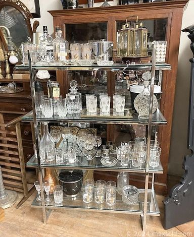 MaxSold Auction: This online auction features items like framed paintings, chrome shelf, vintage electric guitar, trombone, carpet, vintage chair, glassware, serving ware, bed frames, home decors, suede jackets, silverware, vintage glass windows, books, hats, lamps, wine rack, tables, mirror and much more!