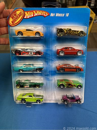 MaxSold Auction: This online auction features Hot Wheels, sports trading cards, Legos, manuals & table, sports collectibles, vintage magazines, and much more!!n