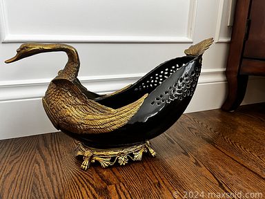 MaxSold Auction: This online auction features House of Chippendale trinket box, mirrors, candle holders, lamps, decanter, clock, and TVs, treasure chest, tub chair, bedroom furniture, executive desk & chair, parson chairs, glass top table, sports collectibles, printer, office supplies, and much, much, more!!!n