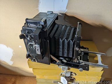 MaxSold Auction: This online auction features file storage cabinet, hotwheels, miniature porcelain plates, tv, office supplies, photocopier, paper cutter, watercolor, sewing machine and accessories, Hugo Meyer camera outfit, collectible stamps, cookie jars, stemware, cocktail tumblers, barware,  coffee mugs, kitchenware, framed nutting-style prints, chairs, commemorative decanter, gumball machine, Limoges plates, pottery bowls, McCoy pottery collection, collection of salt and pepper shakers, Murano-style glass flowers, pewter set, brass sculpture, trading cards, mantel clocks, wood Balinese mask, framed mirror, Ethan Allen black wingback chair, mid-century desk, candlesticks, glass decanters, signed Waterford vase, CDs, antique mahogany cabinet, jewelry box, artist tools,  Danbury mint cast replica of island, hotwheels, Rose Medallion style vase, oak book case, cameras, canon lens, comics, mid-century teak dresser, neckties, framed painting, framed photographs, record albums, mahogany  china closet, japan animal and historic figurines, carved ebonized wood figurines, cloisonne vase, cast iron figures, Thorens Swiss music boxes, Limoges tankard, European porcelain figurines, collection of miniature shoes, barometers, collection of clocks, toys, porcelain tea cup and saucer, puzzles, knick-knacks, Sebastian figurines, books, beer steins, antique bottles, tools, coin banks, library table, mid-century bookcase and much more.