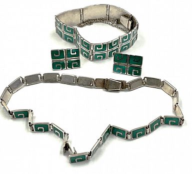 MaxSold Auction: This online auction features gold & gemstone jewelry, teacup/saucer sets, engagement rings, antique pine dresser, drop leaf tea cart, mirrors, area rugs, proof sets, original artworks, Hummels, Royal Doulton figurine, Mexican sterling silver, cement urns, Asian paper scrolls, vinyl records, stamps, antique Tiffany-style lamp, teak table, vintage grape press, art glass, antique stoneware, vintage wood pipes, and much, much, more!!!