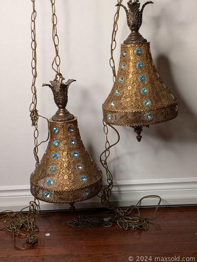 MaxSold Auction: This online auction features Chinese room divider, Indian wedding chairs, nesting boxes, Thai mask, wood carving, wooden printing block, brass statue, vintage musical table, Burmese chests, Italian filigree pendant lamps, African souvenirs, Davenport desk, slot machine, cast iron doorstops, Indonesian puppets, Evesham, decanters, Asian marionettes, TV, area rugs, and much, much, more!!!