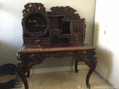 MaxSold Auction: This online auction features Hummel, Royal Albert, crystal ware, Belleek, vintage lamps, furniture such as Japanese carved writing desk, hall table, antique secretary and leather sofa, home decor, glassware, framed art and much more!