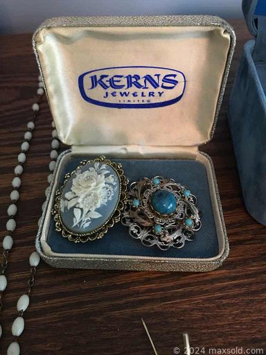 MaxSold Auction: This online auction features a secretary desk, armoire, dresser, costume jewelry, table & mirror, vases, Royal Doulton China, flatware, canisters, sewing machine, rugs, cleaning supplies, garden items and much more!