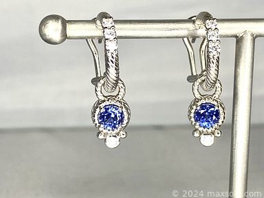 MaxSold Auction: This online auction features 14k and sterling silver jewelry, Disney collectibles, glassware, vintage tools, antique photos, LPs, Fisher Price toys, US stamps, US and international coins and much more!