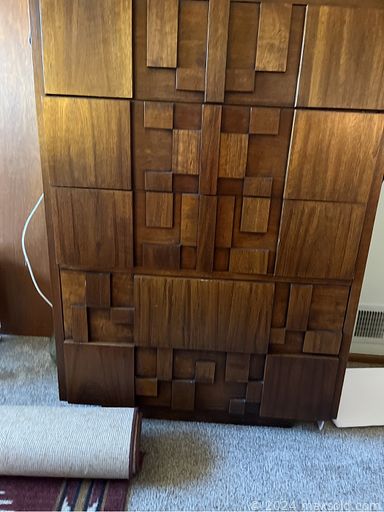 MaxSold Auction: This online auction features furniture such as a Brutalist MCM dresser, rattan patio table and chair set, wooden bench glider, vintage side tables, corner table, AV cabinet, shelving units, vintage school desk, bookcase, console table, couch, china cabinet and others, seasonal decor, BBQ grill, ceramic bells, TV, cameras and cases, lamps, wall art, office supplies, clothing, kitchenware, doll, Southwest rugs, refrigerator, cleaning supplies, books, regulator clock and much more!