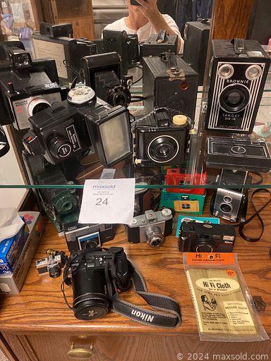 MaxSold Auction: This online auction features furniture such as a leather swivel chair, shelving units, Windsor chairs, coffee table, side table, Danish office chair, curio cabinet and others, kitchenware, small kitchen appliances, sterling silver flatware, hand saws and other tools, Christmas decor, Precious Moments, cleaning supplies, desk lamps, candelabra, vintage cameras, prints and much more!