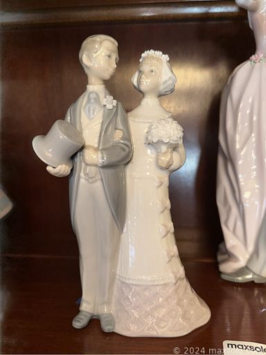 MaxSold Auction: This online auction features Hummel figurines, vintage dinnerware, Lenox collectibles, power snow shovel, yard tools, hurricane lamps, Lladro figurines, teacup/saucer sets, Homer Laughlin tea set, vinyl records, window AC units, power & hand tools, office supplies, antique radios, standing mixers, secretary, board games, cedar chest, sewing machines, guitars, chest freezer, and much more!