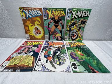 MaxSold Auction: This online auction features desktop Apple computer, vintage cameras, porcelain doll, watches, religious jewelry, costume jewelry, sports collectibles & apparel, Magic cards, vinyl records, M&M collectibles, DVDs, comics, DC comic figures, power & hand tools, Depression glass, vintage books, The Royals collectibles, and much, much, more!!!