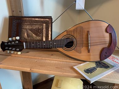 MaxSold Auction: This online auction includes furniture such as a cabinet, dining table, chairs, corner shelving units, bed frame, dresser, Ikea desk and others, Elna sewing machine, Gold Gym bike, kitchenware, small kitchen appliances, seasonal decor, garden tools, Royal Doulton and other china, artworks, crafting supplies, mandolin, office items and more!