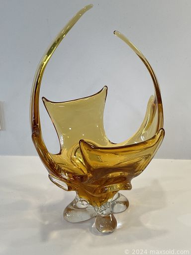 MaxSold Auction: This online auction features furniture such as tables and chairs, electronics such as floor lamps and vintage Marconi record player, home décor such as wall art, glass art, and ceramics, vintage signs such as Coca-Cola, and much more!