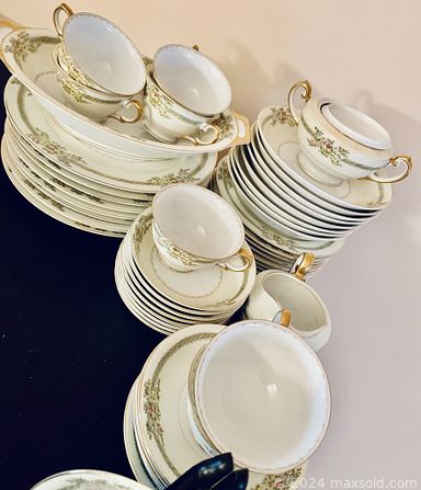 MaxSold Auction: This online auction features MCM chairs, mid-century breakfront, mid-century couch, books, home decor, glassware, signed wall art, Meito china and much more!