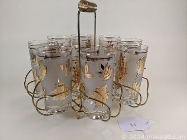 MaxSold Auction: This online auction features end tables, steel wire footstool, curio display shelves, pottery & walnut table lamp, hall china pink teapot, corning ware, Lenox porcelain bowl, portable typewriter, mechanical juicer, vintage Columbia bicycle and much more!