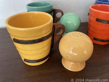 MaxSold Auction: This online auction includes furniture such as an MCM coffee table, Midcentury sleeper sofa, vintage wood desk, dressers, MCM side tables, display shelves, MCM dining table, chairs, Midcentury console stereo and others, Gorham silverplate, silverware, Bauer Ringware mugs, Corningware, Pfaltzgraff and other china, kitchenware, small kitchen appliances, vintage Barbies and other toys, vintage costume jewelry, Singer sewing machine, vintage records, Midcentury lamps, Royal typewriter, antique grandfather clock, electronics, vintage books, decorated eggs and other display figures, vintage luggage, wood crates, clothing, accessories, jewelry, vintage Kodak cameras, linens and many more!