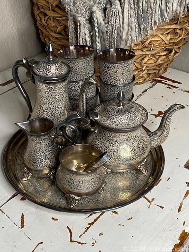 MaxSold Auction: This online auction includes an antique carved rosewood table, Indigenous items, jewelry, accessories, silver items, carvings, pottery, banknotes, decor, kitchenware, servingware, vases, wall art, Royal Albert and other china, sculptures, ephemera and much more!