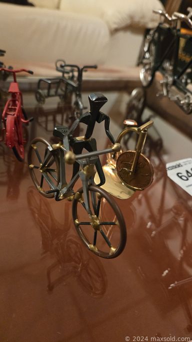 MaxSold Auction: This online auction features stamping machine, Royal Doulton figures, soapstone figures, demitasse cups/saucers, elephant collection, sake set, African drums & masks, games,  Maasai statues, bar art, bar stools, mini bicycle collection, exercise equipment, viintage books, party supplies, marble eggs, clay art, and more!