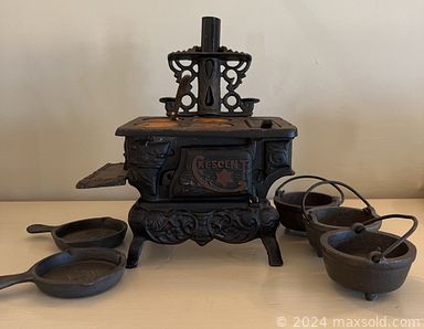 MaxSold Auction: This online auction includes furniture such as an antique secretary, side tables, rocker, vanity chairs, drafting table, antique washstand, couch and others, power tools, hand tools, hardware, kitchenware, small kitchen appliances, books, vinyl records, seasonal decor, lamps, wooden clock, vintage stuffed animals, bells, organ, miniature wood stove, photography items, GE washing machine, yard tools, wall art, massage cushion, cleaning tools, Royal Worcester, Goebel and other figures, pottery, wicker items, clothing, accessories and many more! n