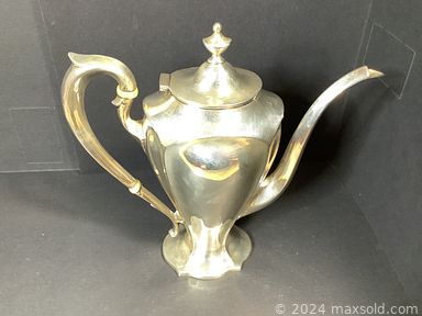 MaxSold Auction: This online auction features sterling silver, woodblock prints, framed art posters, furniture such as caned back armchair, inlaid wood stools, side tables, wooden hutch, and rattan chairs, and much more!