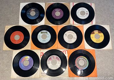 MaxSold Auction: This online auction features art glass, mantle clock, MCM teak table lamps, Disney collectibles, vintage toys, lighthouse collection, Avon doll collection, antique Stradivarius violin, vintage collector spoons, Holiday Barbie, antique glass insulators, vinyl records, vintage peacock chairs, Pokemon cards and much more!