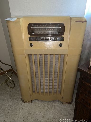 MaxSold Auction: This online auction includes Baldwin organ, Native American artwork, collectible cars and motorcycles, furniture such as side tables, rocker recliners, coffee table, wooden table with chairs, couches, bookshelves and entertainment cabinet, books, clothing, kitchenware, DVDs, office supplies, Raleigh bicycles, holiday decor, crafting supplies, and much more!