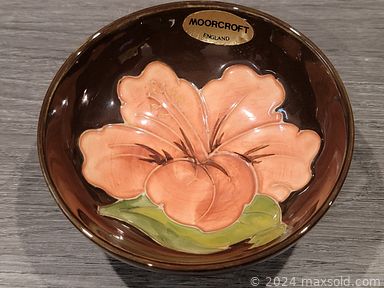 MaxSold Auction: This online auction features Moorcroft dish, bisque vase, sterling silver jewelry, decoy, brass miniatures, art glass items, old vanity pieces, stamp collection, Okimono figurines, native sand painting, pottery, wood train set, other wooden items, Lego, Pez dispenser, Looney tunes collectible cards, comics, old military & police buttons and much more.